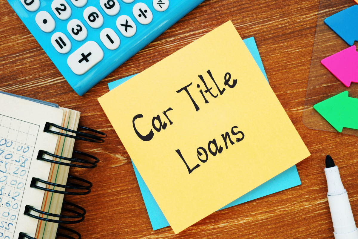Car Title Loans sign on the page. Instant Auto Loans